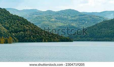Lake and mountain landscape in Kocaeli Turkey. Beautiful nature landscape in Turkey. Stream going through mountains. Beautiful composition. Selective focus included.