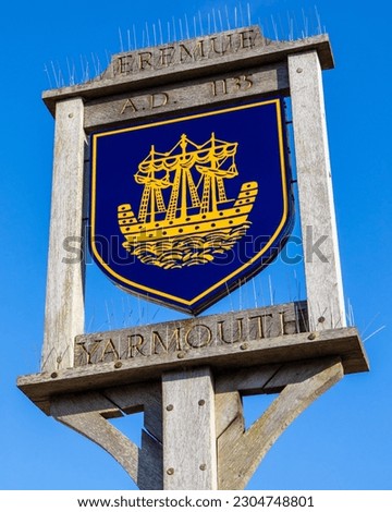 A sign portraying the town crest of Yarmouth, on the beautiful Isle of Wight, UK.  