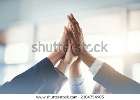 High five, businesspeople and their hands together for cooperation with lens flare. Collaboration or teamwork, group or coworkers support and people with hand in air for unity or achievement Royalty-Free Stock Photo #2304754905