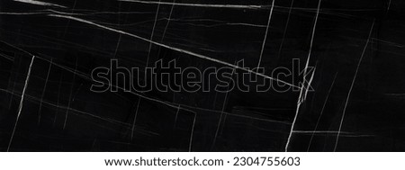 black marble background. black Portoro marbl wallpaper and counter tops. black marble floor and wall tile. black travertino marble texture. natural granite stone. Royalty-Free Stock Photo #2304755603