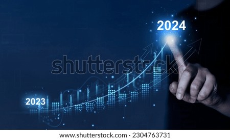 Business success and growing growth 2023 to 2024 year. Growth and development chart of company in new year 2024. Royalty-Free Stock Photo #2304763731