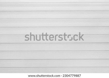 White horizontal lines timber striped pattern fence boards wooden texture light background plank surface. Royalty-Free Stock Photo #2304779887