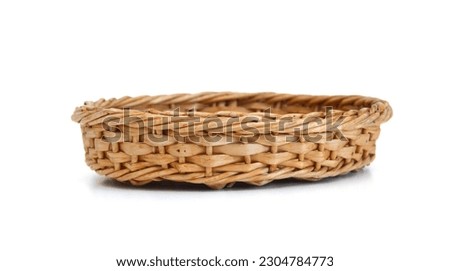 Empty wooden fruit or bread basket on white background  Royalty-Free Stock Photo #2304784773