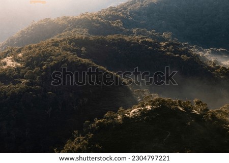 Sunrise in the mountains of the preserved Atlantic Forest Biome in Mantiqueira Mountain, Minas Gerais Royalty-Free Stock Photo #2304797221