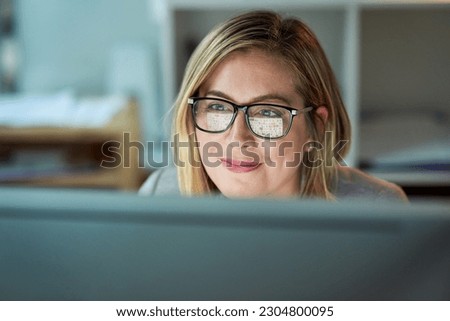 Glasses, working and business woman on a computer or reading for a project deadline or editor and in an office. Research, email and content plan or revision or review and writing online publication