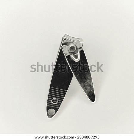 Baby silver  nails clipper with white background.