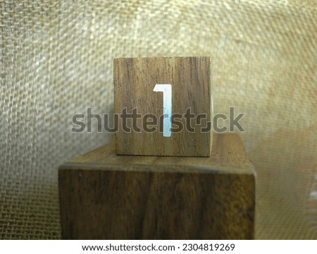 number 1 on a brown background