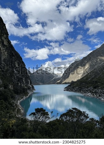 Paron Lake, Lagoon Parón, Huaraz, Caraz, Peru. a divinely beautiful blue lake against the background of an icy snowy mountain peak. Paramount Pictures peak