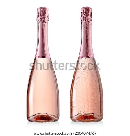 Two rose champagne bottles with and without drops on white background Royalty-Free Stock Photo #2304874767