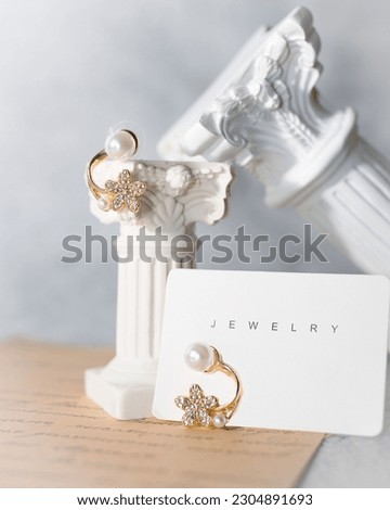 gold earrings advertising photography by love