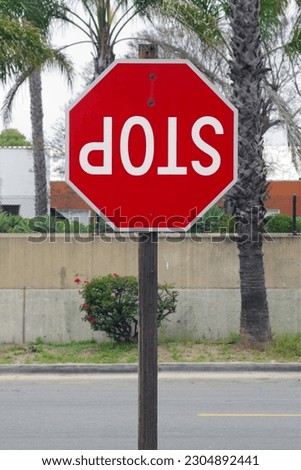 Upside down installed STOP sign