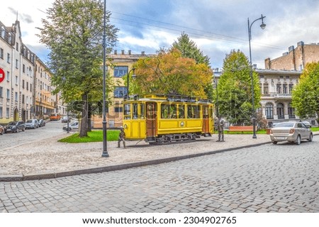 An old historical tramway transformed into a café, Vyborg, Russia Royalty-Free Stock Photo #2304902765
