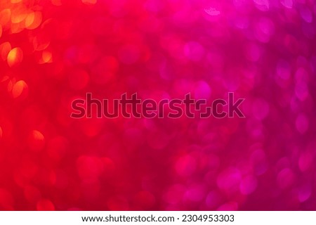 Abstract blurred background. Defocused portrait lens back. Backdrop bokeh. Design blank. Graphic resource for the designer. Vivid red and dark pink.