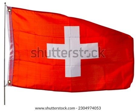 Swiss flag flies proudly in wind. Isolated over white background