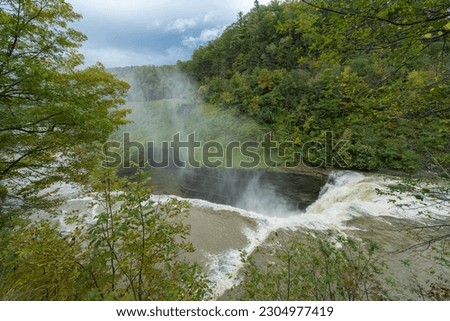Scenic autumn view of waterfall in Letchworth State Park - a 14,427-acre (5,838 ha) New York State Park located in Livingston County and Wyoming County in the western part of the State of New York,USA
