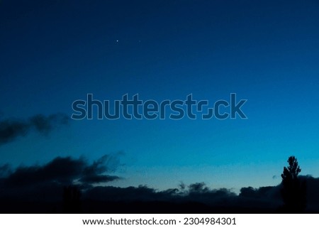 Jupiter and Venus in the twilight sky
 Royalty-Free Stock Photo #2304984301