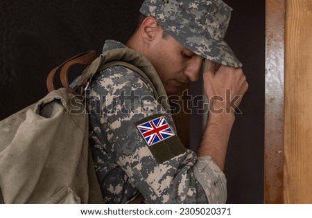 Flag of United Kingdom on military uniform. UK Army. British Armed Forces, soldiers. Royalty-Free Stock Photo #2305020371