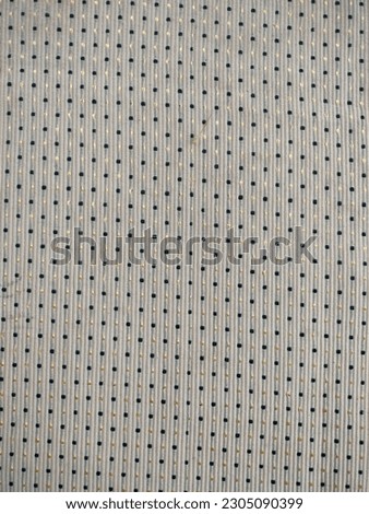 Black dot pattern on cloth. Dot Pattern.