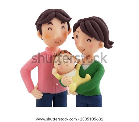 Happy couple looking at their baby(This is a photo of a clay work)