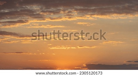 Colorful sky with clouds at sunset background.