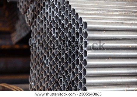 Stainless steel pipes closeup abstract industrial photo