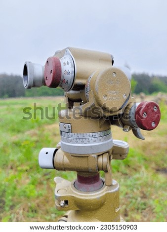 A combat compass bussole for aiming artillery is installed on the field.  Ukraine. training Royalty-Free Stock Photo #2305150903