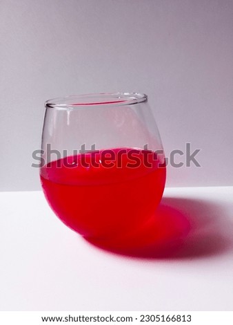 Fresh drink watermelon.  Watermelon-flavored fresh drink in a bubble glass on a white background.