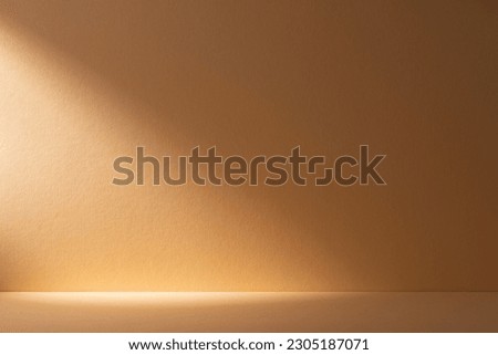 Yellow background with abstract shadows and sunlights. Shadow wall background nature texture.