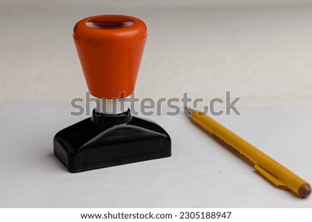 Approved Notary Stamp Rubber Stamp. Hand Pressing Royalty-Free Stock Photo #2305188947