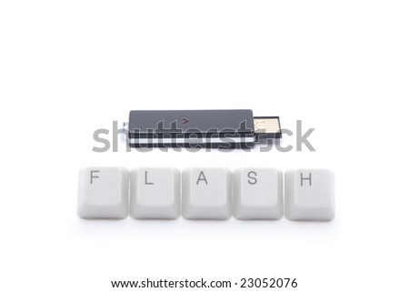 Stylish usb flash drive and "flash" sign made of keyboard keys