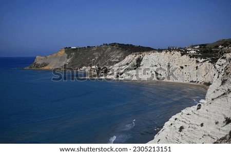 Landscape with scenic view of Scala Dei Turchi a natural landmark with spectacular rock and cliff formations in the province of Agrigento in Sicily, Italy.