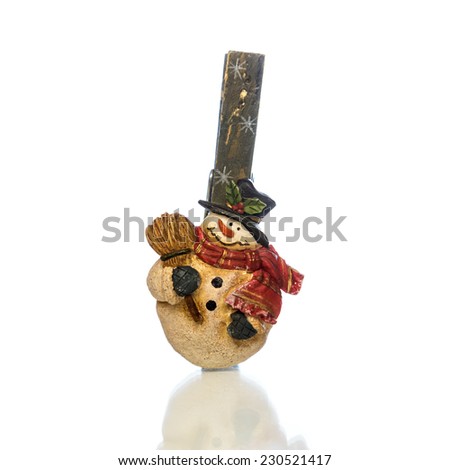Christmas snowman clothespin on white background