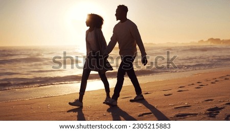 Couple holding hands, walking on beach at sunset and ocean with silhouette, vacation and travel with mockup space. Love, romance and trust with people in commitment, tropical holiday and sea view