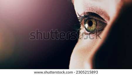 Woman, face and closeup of eye on mockup space for vision or sight against a dark background. Female person with eyelashes and green or hazel eyes looking in perception, eyesight or light on mock up Royalty-Free Stock Photo #2305215893