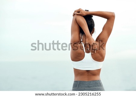 Woman, back stretching and outdoor for yoga, workout and training with mockup space. Wellness, nature and ocean with female person doing exercise for health and relax by the sea with stretch arms Royalty-Free Stock Photo #2305216255