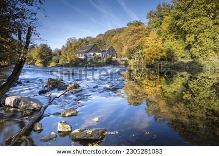 A small house close to the Wupper river during autumn, Solingen, Germany Royalty-Free Stock Photo #2305281083