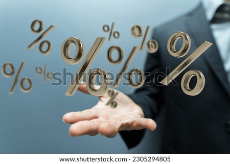 The male man's hand touching the virtual percentage icons with his fingers. Sale concept Royalty-Free Stock Photo #2305294805