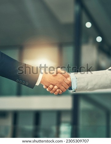 Partnership, handshake and hands of business people in office for hiring, recruitment deal and thank you. Corporate, collaboration and male workers shaking hands for onboarding, support and teamwork Royalty-Free Stock Photo #2305309707