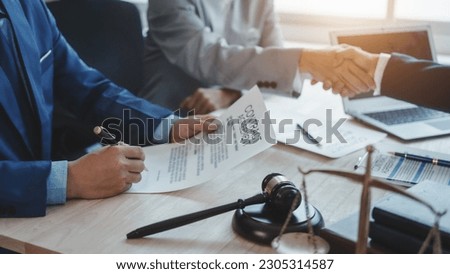Shaking hands, Business lawyer team. Working together judge counselor having team meeting with client discussing legal legislation at law firm, Law and Legal services concept.