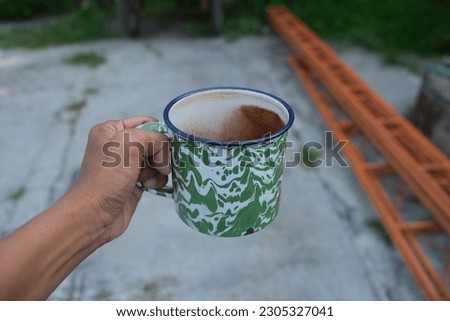 photo of cup of green tea in glass