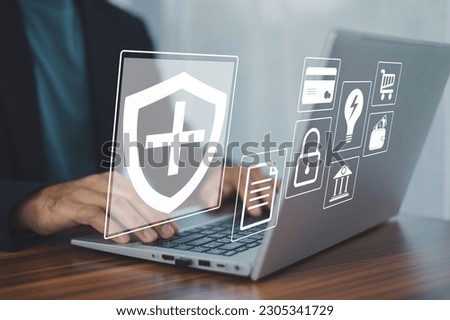 Insurance concept, Businessman using a computer to insurance online for car, travel, family and life, financial and health insurance. Non life insurance. Royalty-Free Stock Photo #2305341729
