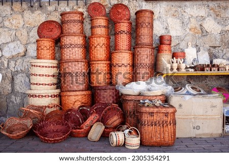 Traditional baskets woven with natural fiber Royalty-Free Stock Photo #2305354291