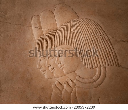 relief showing three men with short haired wigs from the tomb of the Royal Scribe (Khaemhat ) in Thebes - Luxor . Egypt .   Royalty-Free Stock Photo #2305372209