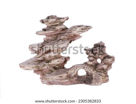 decorative rock for an aquarium on a white background