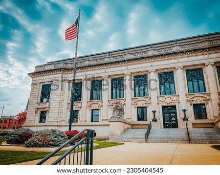 Front View of the Illinois Supreme Courthouse Building with American Flag Royalty-Free Stock Photo #2305404545