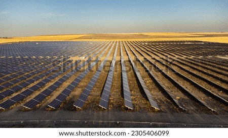 View of a solar panel power plant in Alberta.  Royalty-Free Stock Photo #2305406099