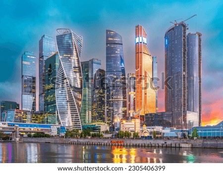 High buildings of Moscow-City at Moskva River at summer sunset, Russia. Moscow-City is business district in Moscow. Panorama of modern office buildings at summer sumset, Moscow downtown in summer Royalty-Free Stock Photo #2305406399