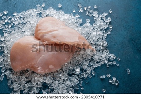 fresh chicken filet on ice