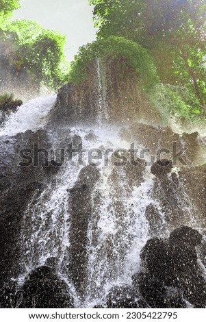 View of a waterfall on a mountain