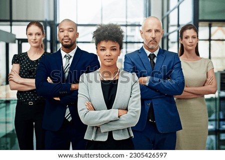 Portrait, business people or serious teamwork with arms crossed for diversity, professional commitment or office pride. Group, African woman or global collaboration leadership of corporate employees Royalty-Free Stock Photo #2305426597